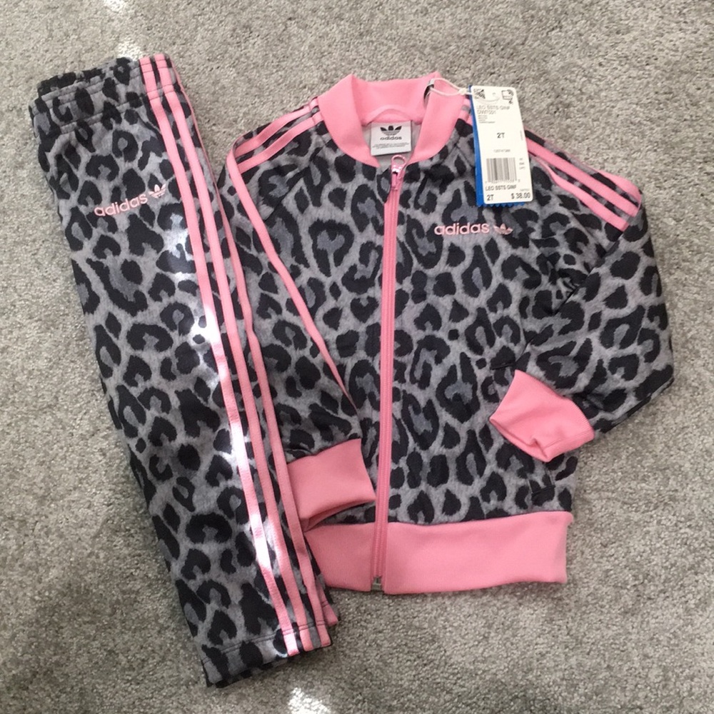 Brand New Adidas Leopard Track Suit in a size 2